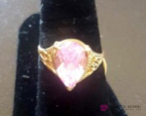 Ladies 14 karat gold ring with pink stone