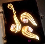 10 karat gold matching earrings and charm