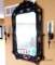 30 in by 45 in metal framed mirror with candle sconces