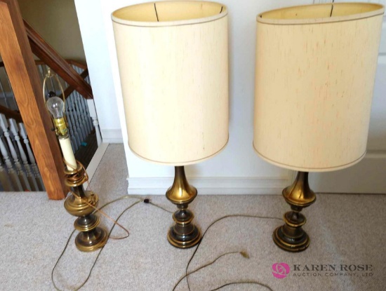 Three 36 inch tall brass lamps