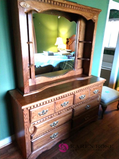 Four pieces of bedroom furniture two dressers and two nightstands,and hutch mirror
