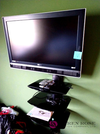 Sony Bravia 40 in TV with wall mount and remotes