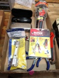Tool lot including adjustable wrenches and tire pressure gauges
