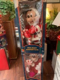 Two Mickey unlimited animated Christmas figures