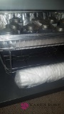 Plastic and styrofoam cups and pan warmers