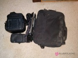 Tripod and two camera carrying cases