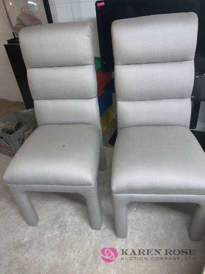 Pair of padded dining room chairs