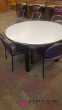 4 foot round table plus 4 chairs