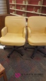 Two tan computer chairs