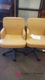 Two tan computer chairs