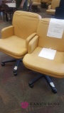 Two tan computer chairs