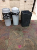 Three wastebaskets