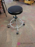 Rolling adjustable stool