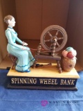 Spinning Wheel Cast Iron Mechanical Bank