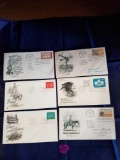 27 First Day Issue Stamps
