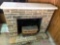 Front garage Full-size fireplace made from plaster