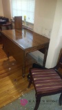 Drop leaf table with three chairs