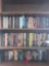 3 shelves of books. Dr. Phil, Grisham, and killerman