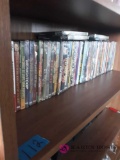 Shelf of DVDs, red skelton