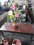 Coffee table and flower arrangement