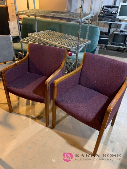 Two burgundy office chairs