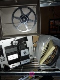 8mm projector and reels.