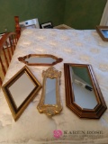 4 small framed mirrors b1