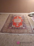 9 foot by 6.5 foot area rug B2