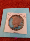 Cut out peace dollar