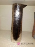 Hammered metal pitcher (office)