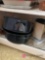 Bottom shelf of kitchen cabinet roaster