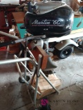 Martin 60 outboard motor on stand