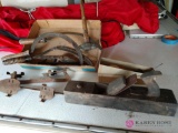 Vintage wood plane and woodworking tools and ice skates