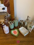 Bathroom decorative soap dispensers toothbrush holders etc.