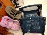 Two car seats in Graco playpen