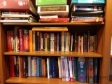 Three shelves of books