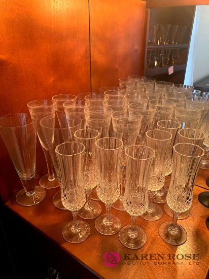 Clear glass stemware and Waterford champagne glasses