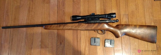 Remington 222 rifle with scope into clips