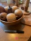 Wooden bowl with fruit and wooden candle stick holders