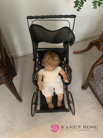 Vintage doll buggy and baby doll