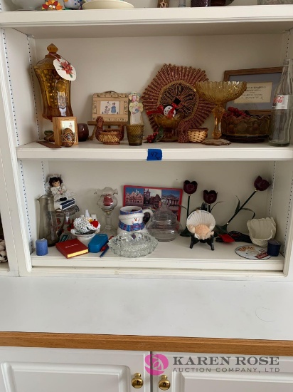 Two shelves of knickknacks orange  coin Glass amber glass