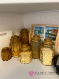 Set of amber canisters