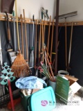 Yard tools and miscellaneous in corner of garage