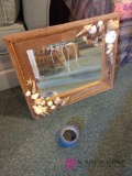 framed shell mirror