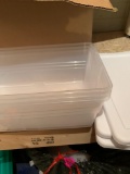 Lot of small plastic totes