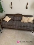 Cane back sofa with cushions