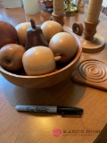 Wooden bowl with fruit and wooden candle stick holders