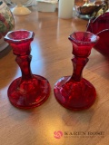 Red glass bowl and candle stick holders