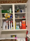 Cleaning supplies above washer and dryer