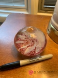 Glass paperweight signed